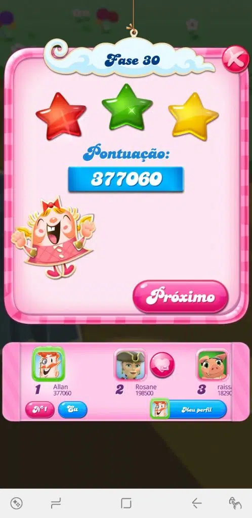 Testamos e recomendamos os melhores jogos grátis de android da década Candy crush saga na vertical, menu final após a partida com três estrelas completas