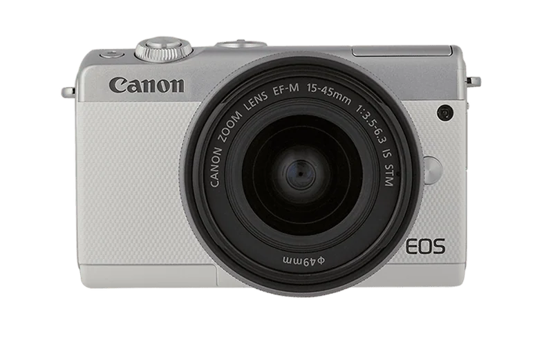 Listamos as 16 melhores câmeras fotográficas para você tirar fotos e gravar vídeos incríveis Canon eos m100 frente à um fundo branco