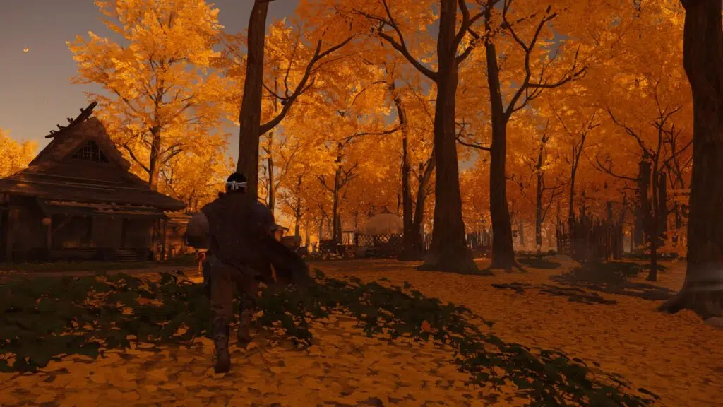 Review: ghost of tsushima, o incrível último jogo exclusivo do playstation 4 Jin corre entre árvores de folhas amarelas.