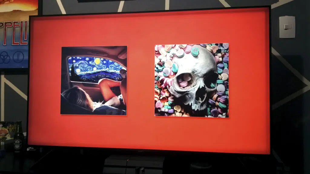 Review: samsung crystal uhd 4k, a melhor smart tv 4k de entrada de 2020 Modo ambiente com quadros artísticos em fundo laranja