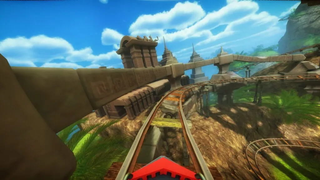 8 incríveis apps de realidade virtual para iphone Trilho de montanha russa à frente de um carro, nuvens acima e construções e natureza ao redor.
