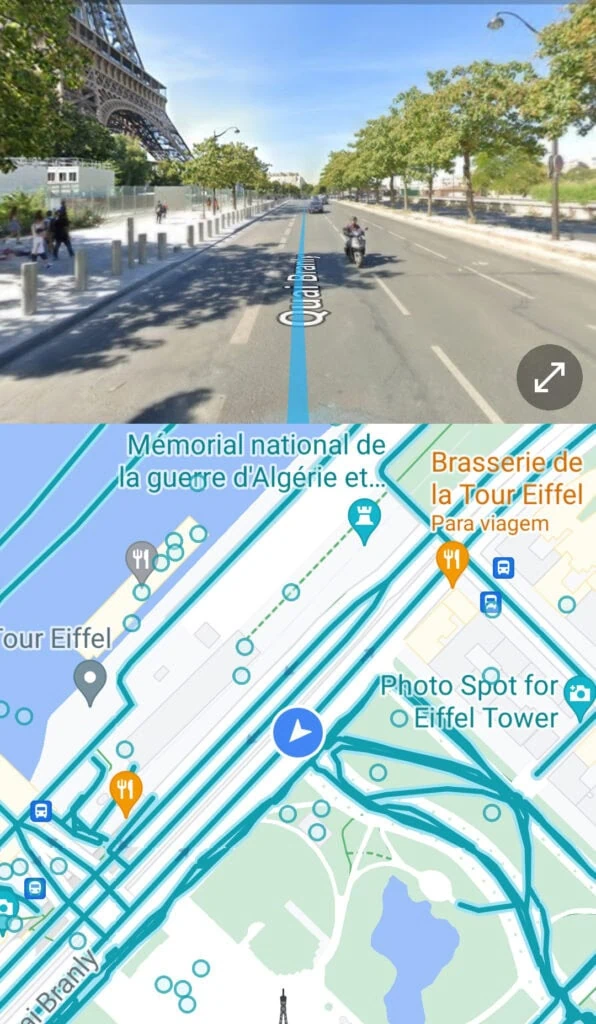 21 dicas e truques para google maps Captura de tela do aplicativo google maps com street view de rua próxima à torre eiffel, com uma linha azul. Na parte inferior, o mapa da torre eiffel com linhas em azul petróleo e um ícone azul índigo sobre uma das linhas.