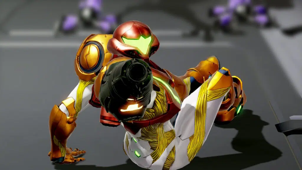 Review: metroid dread é simplesmente incrível Samus, caída ao chão, aponta seu canhão para a câmera.