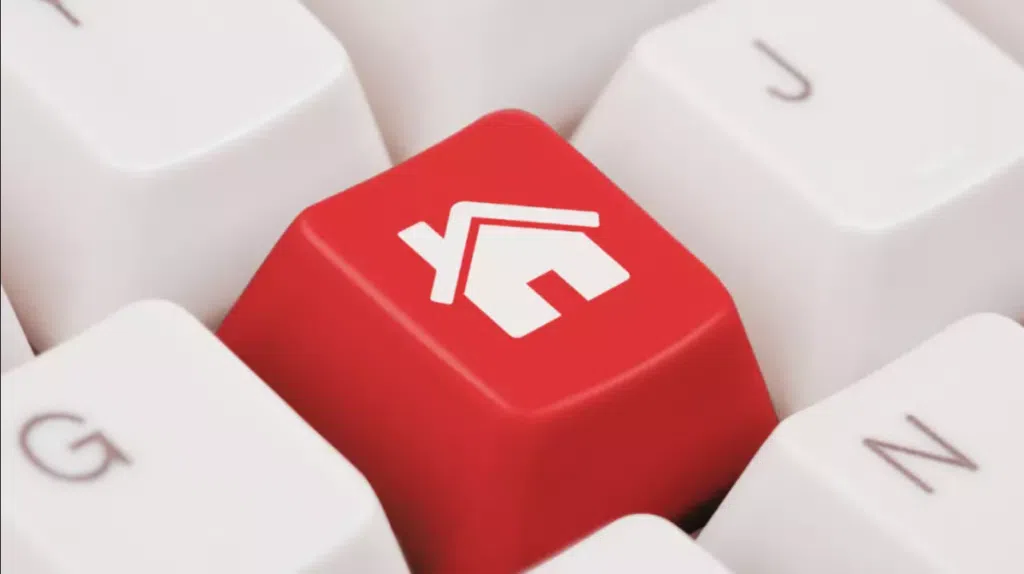 Fifth floor acquisisce Navent, un gruppo di 6 portali immobiliari Foto di una tastiera con tasto home