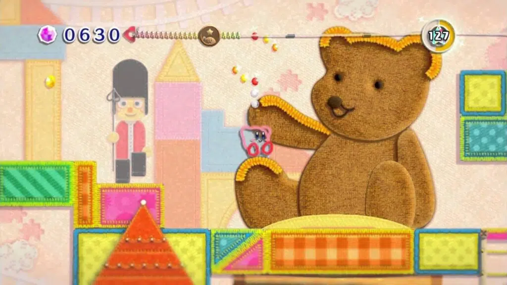 Os 20 melhores jogos de nintendo wii Screenshot de kirby epic yarn, desenvolvido pela hal laboratory em parceria com a good-feel (imagem: reprodução)