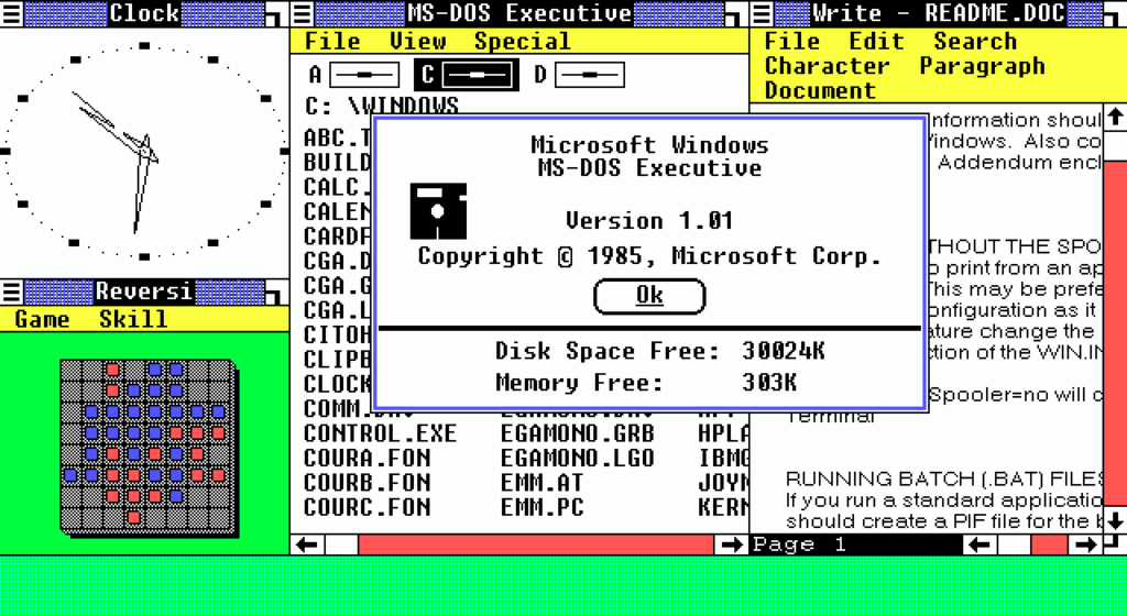 A imagem mostra a interface do microsoft windows 1. 0, com cada janela ocupando uma parte da tela e uma caixa de diálogo sobreposta sobre as janelas. (foto: reprodução)