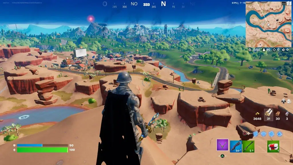 Review: notebook dell inspiron 15 3000 Imagem do game fortnite com um personagem no alto de uma montanha com desertos e florestas