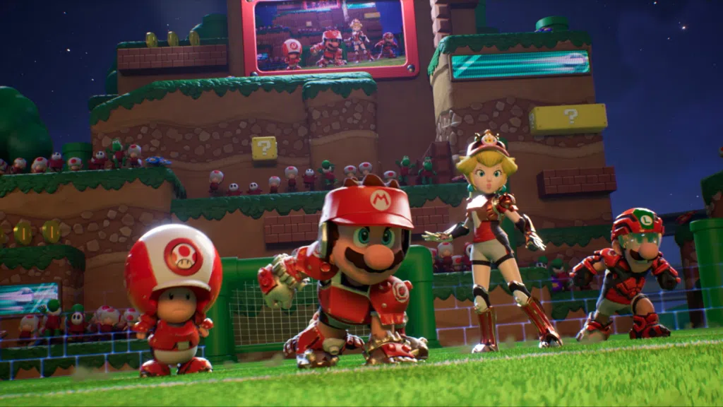 Review: mario strikers battle league mistura futebol, porrada e muita diversão Imagem do time do mario, com ele, toad, peach e luigi em mario strikers battle league