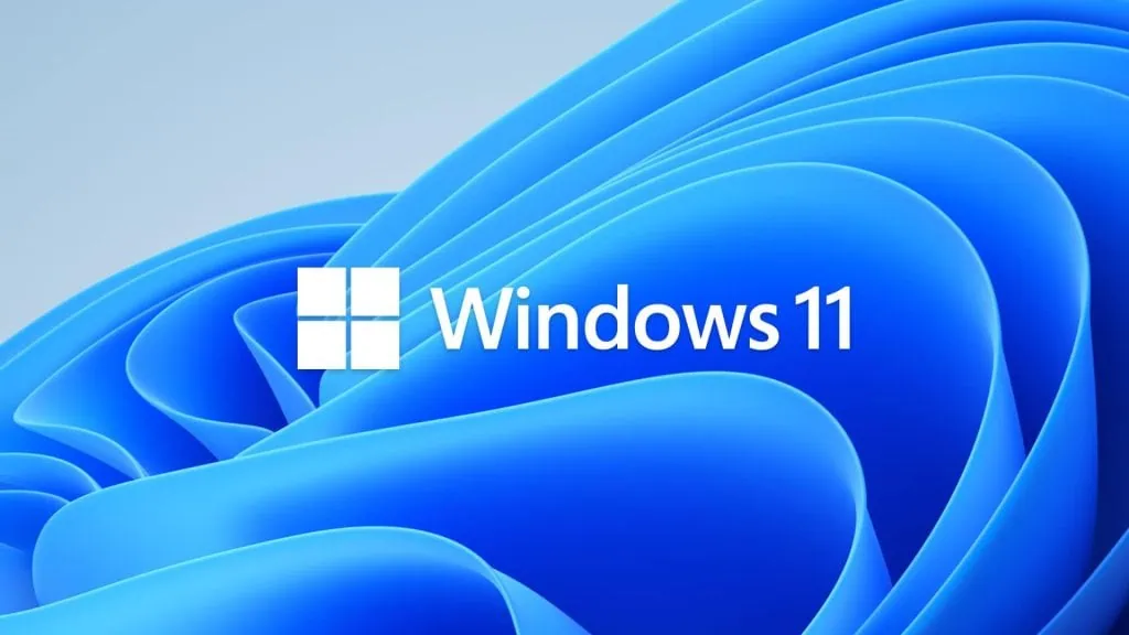 Comment installer Windows 11 avec une clé USB Comment installer Windows 11 avec clé USB ? Image publicitaire Microsoft avec la nouvelle identité visuelle de windows 11 - showmetech