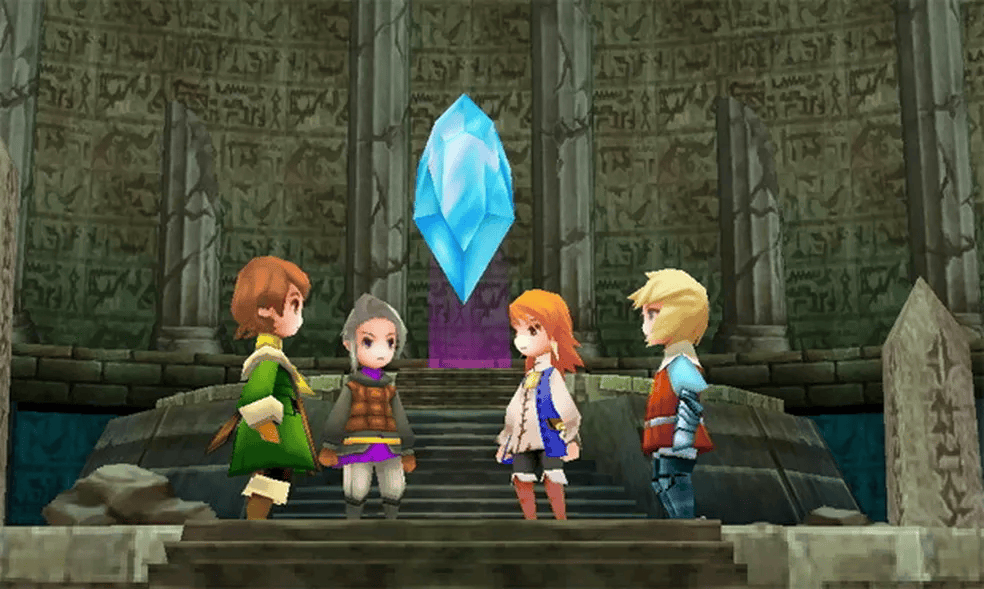 Os 20 melhores remakes de jogos da história Screenshot de final fantasy iii em que os quatro personagens do jogo rodeiam um cristal.