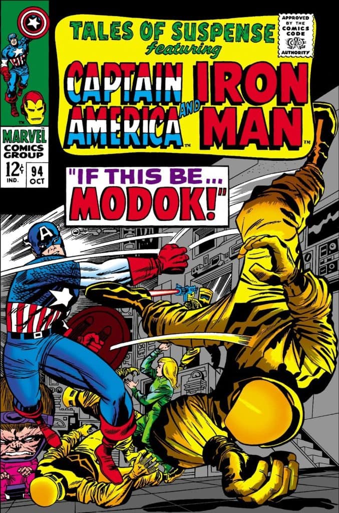 Capitão américa luta contra modok e homem de ferro em quadrinho clássico da marvel.