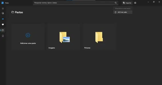 Como transferir fotos do android para o pc Página inicial do aplicativo fotos do windows, com opções de pastas dispostas ao centro da tela. No topo, é possível verificar os dispositivos conectados ao computador para acesso de mídias.