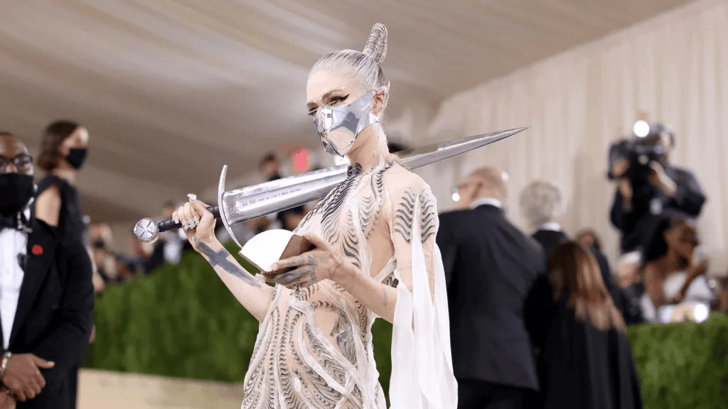 Grimes vil dele overskudd med ias som genererer sanger med stemmen hans Grimes vil dele overskudd med andre som genererer sanger med stemmen hans