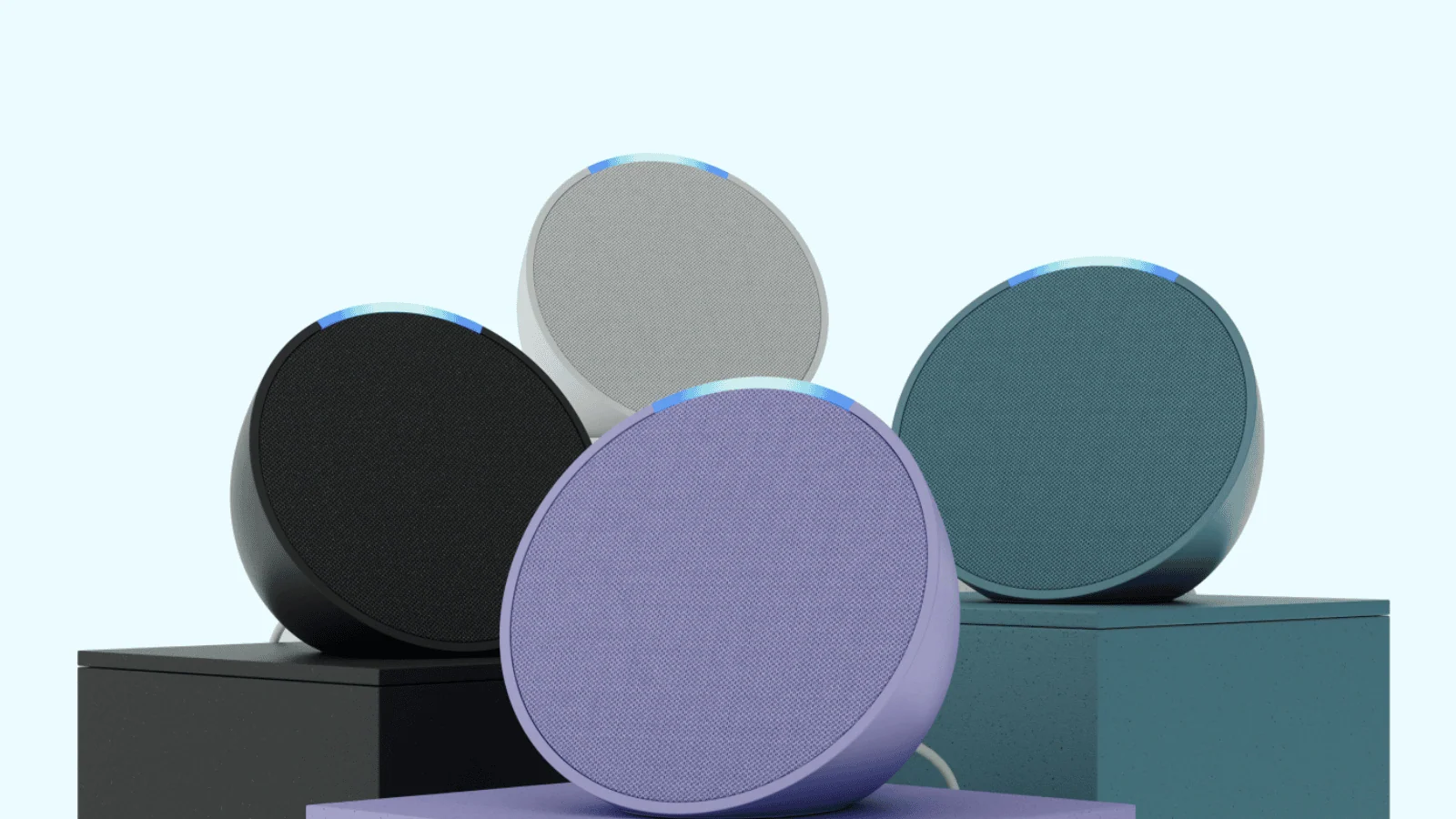 Alt text: caixa de som echo pop com alexa, disponível no brasil, em várias cores modernas.