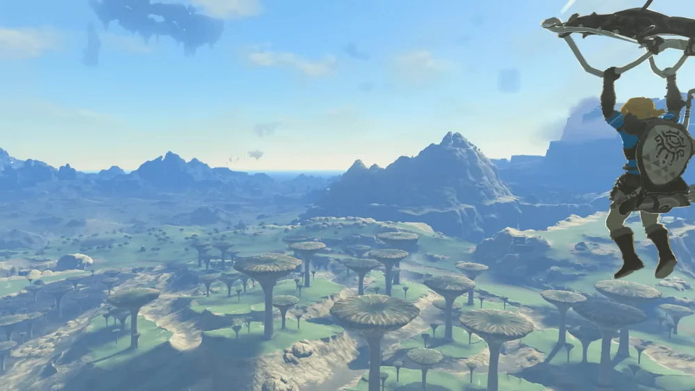 Dicas e truques para dominar tears of the kingdom Link sobrevoa o céu por hyrule
