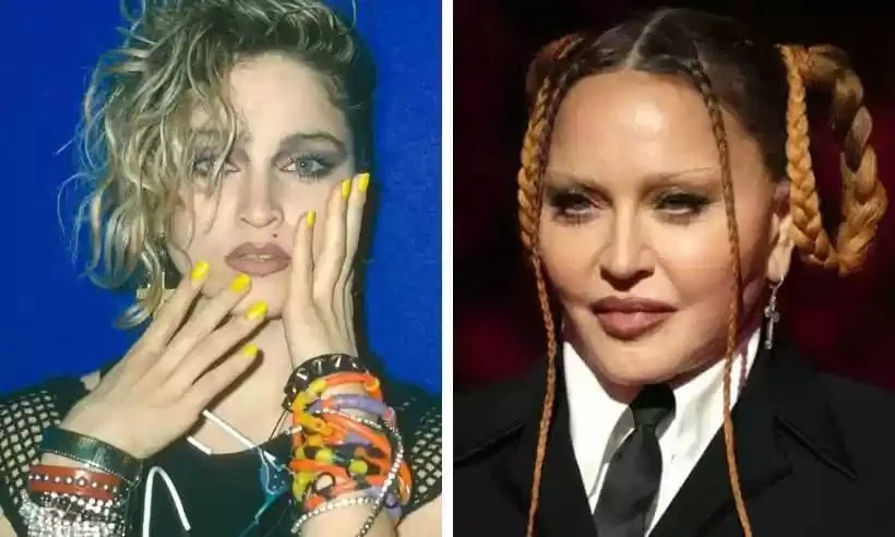 Wanita muda berwarna-warni dengan rambut keriting, mengenakan aksesori dan cat kuku kuning, dengan ekspresi terkejut.