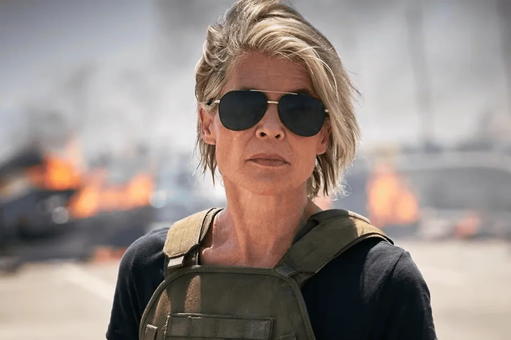 Tudum: confira tudo o que rolou no evento da netflix Atriz linda hamilton em seu papel na franquia o exterminador do futuro.