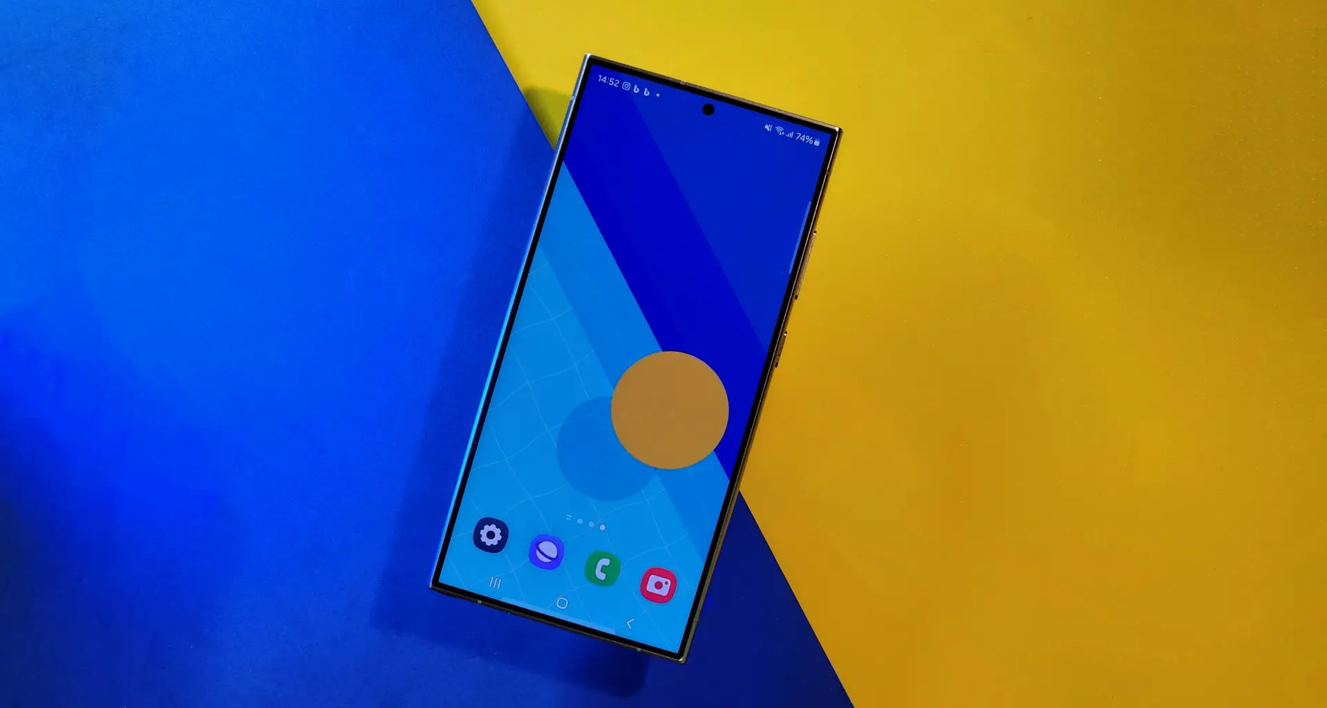 Samsung Galaxy Note smartphone on a vibrant blue and yellow background.