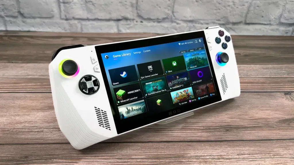 Melhores consoles portáteis de pc e videogame para comprar já Jogador portátil asus rog phone com tela de jogos e controles integrados.