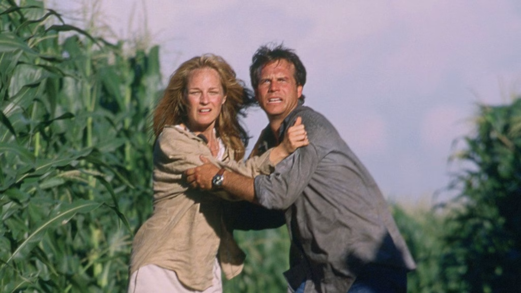 Crítica: twisters (2024) tira o fôlego com os tornados e faz uma boa releitura do clássico de 1996 Cena de twister, de 1996, com helen mirren e bill paxton. (foto: reprodução/amblin productions/warner bros. Discovery)