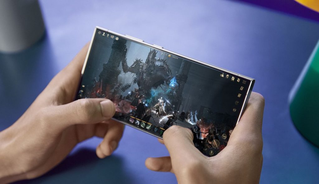 Celular gamer com jogo de fantasia épica em alta resolução.
