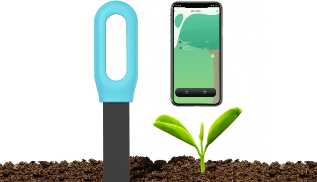 Veja os melhores produtos para a casa conectada (2025) Dispositivo de irrigação inteligente controlado por smartphone e planta jovem.