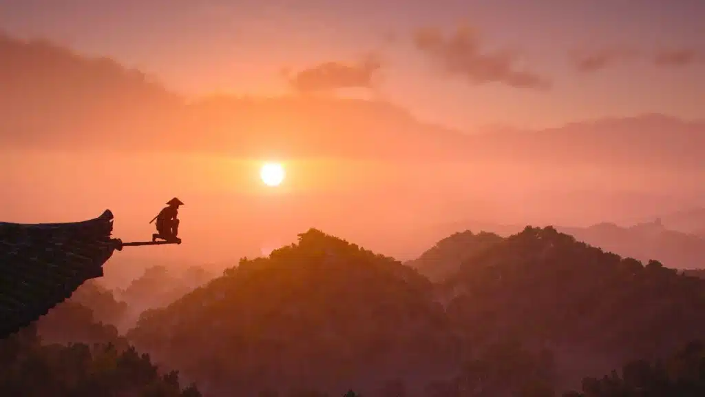 Review: assassin’s creed shadows é um épico de traição e vingança no japão feudal Ninja no topo de uma torre ao pôr-do-sol