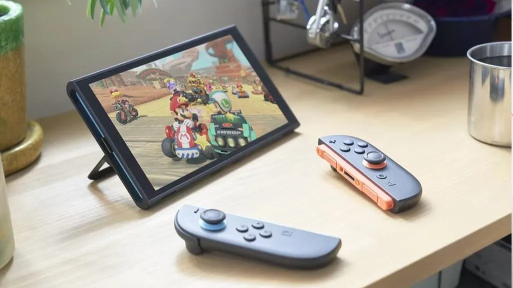 Review: novo nintendo switch 2 vale a pena? Switch 2 apoiado na mesa com mario kart