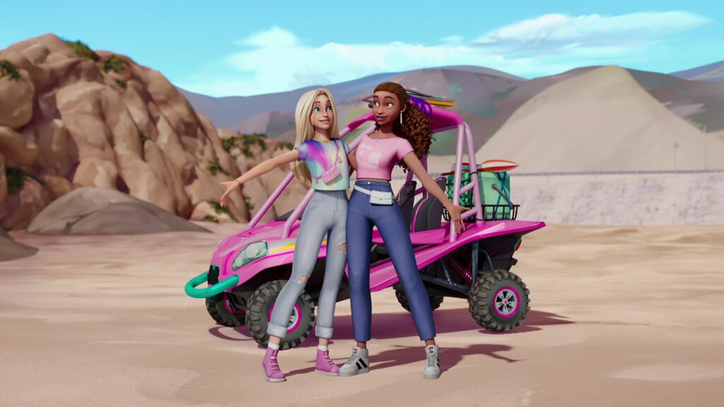 Meninas jovens brincando ao lado de quadriciclo rosa em deserto, cenário de aventura e diversão.