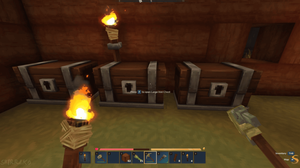 Chests in minecraft game with torch and tool in hands, inside wooden house, gaming setup, survival multiplayer.