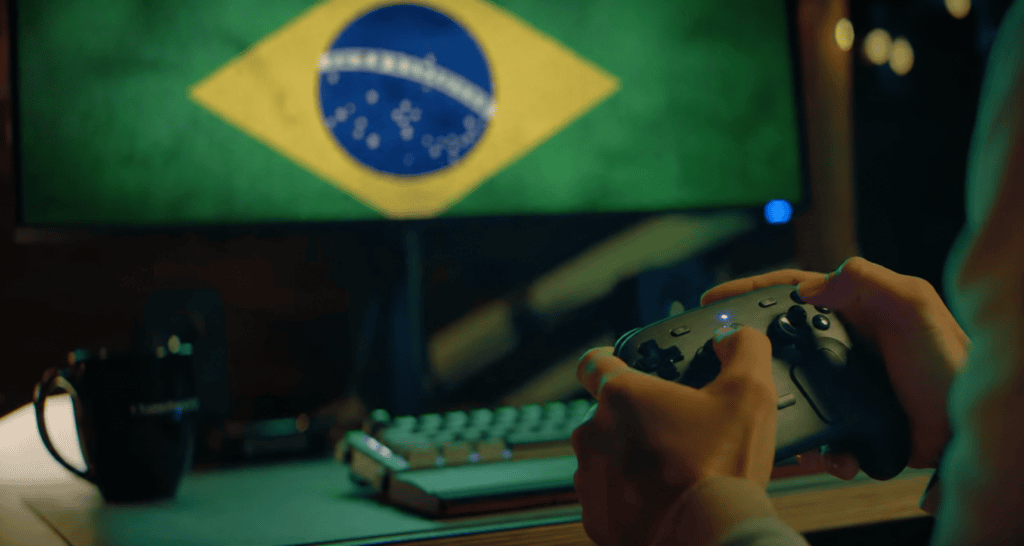 Imagem editada mostrando uma pessoa jogando com o steam controller enquanto o monitor à sua frente exibe a bandeira do brasil