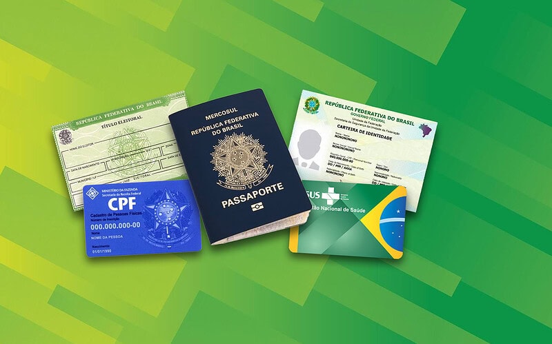Vários documentos de identidade brasileiros agrupados em uma foto com fundo de tons diferentes de verde