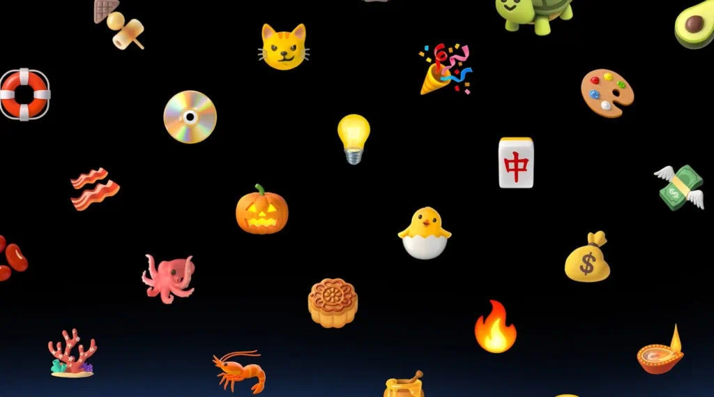 Android show 2026: veja tudo que o google lançou! Coleção de emojis 3d da noto espalhados sobre fundo preto, incluindo gato, lâmpada, abóbora, polvo, camarão, sorvete, maquiagem, salvavidas e outros símbolos coloridos e detalhados.