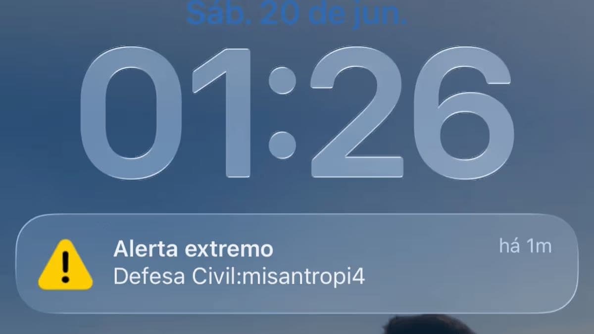 Tela de celular exibindo mensagem de alerta de emergência com a palavra 'misantropia'