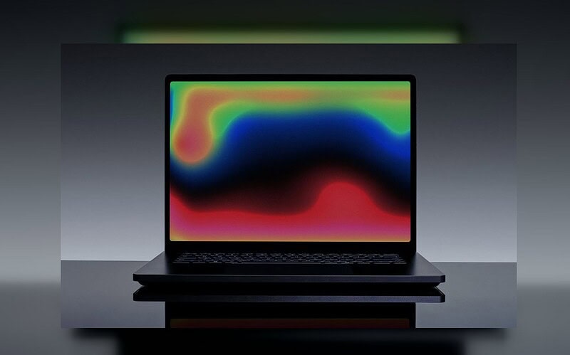 Notebook aberto com arte colorida na tela, em composição 16:9 com margens para capa da matéria sobre nvidia rtx spark.