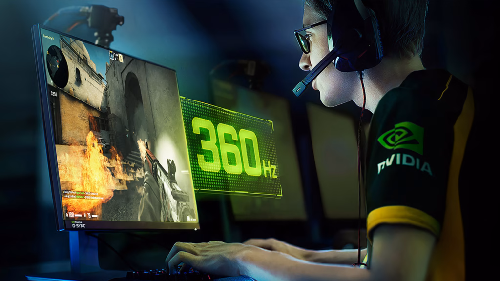 O que é vrr: entenda a taxa de atualização variável em monitores e tvs Jogador profissional em frente a um monitor de 360 hz com selo nvidia g-sync exibindo jogo de tiro em primeira pessoa, demonstrando o que é g-sync em taxas de atualização ultrarrápidas.