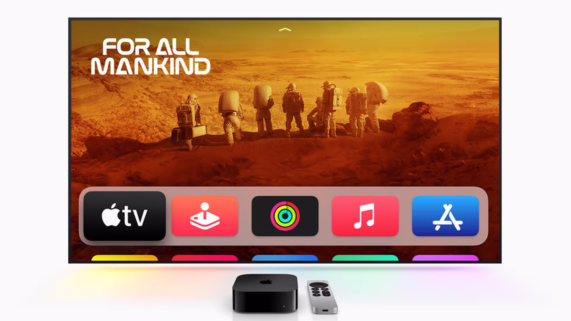 Apple pode lançar novos homepod mini, apple tv 4k e hub doméstico com tela Apple tv 4k atual e siri remote posicionados diante de uma televisão.