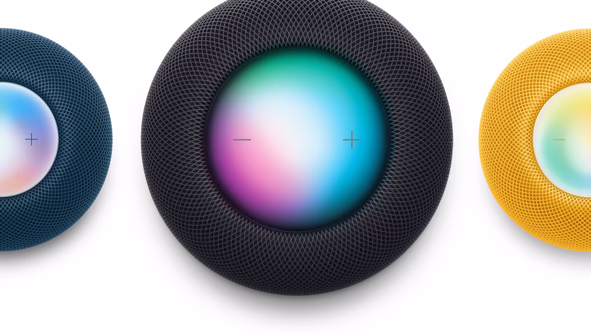 Apple pode lançar novos homepod mini, apple tv 4k e hub doméstico com tela Três unidades do homepod mini atual vistas de cima, nas cores azul, meia-noite e amarelo.